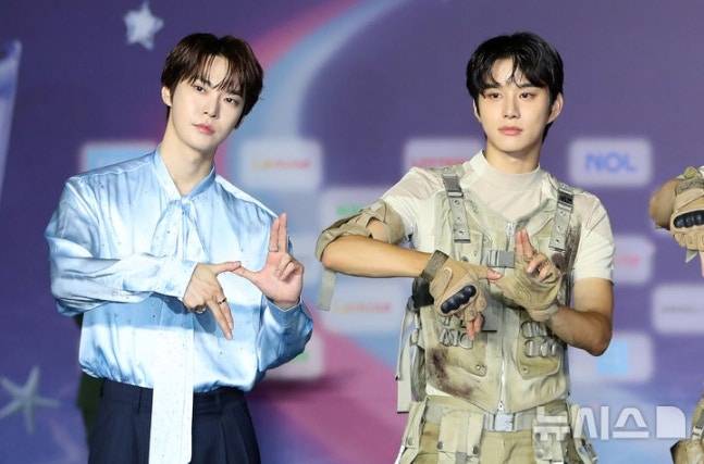 그룹 NCT127 도영(사진 왼쪽)과 정우. [뉴시스]