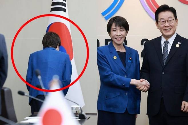 다카이치 사나에 일본 총리(붉은 원)가 30일 경북 경주 APEC 정상회의장에서 열린 이재명 대통령과의 한일 정상회담에서 기념촬영 후 자리로 향하기 전 태극기에 예를 표하고 있다. 대통령실통신사진기자단연합뉴스