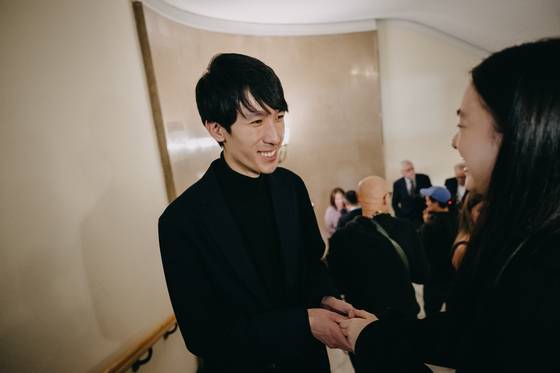 Pianist Eric Lu is seen after the announcement of results during the final stage of the 19th International Fryderyk Chopin Piano Competition at Warsaw Philharmonic Hall in Warsaw, Poland, on Oct. 21. [CHOPIN INSTITUTE]