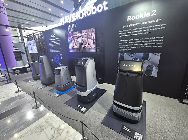 Naver’s lineup of robots developed since 2017 is on display at the Naver Labs booth during the DAN 25 conference. [EO HWAN-HEE]