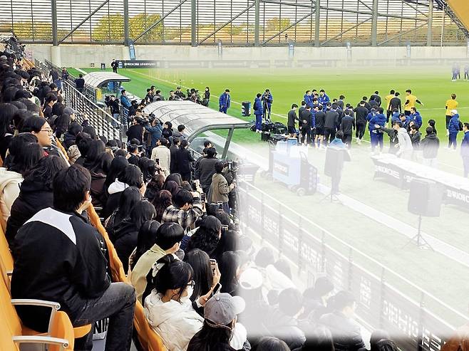 축구팬들이 11일 천안의 대한민국 축구종합센터 메인스타디움에서 진행된 오픈 트레이닝에서 선수들이 땀흘리는 모습을 지켜보고 있다. 천안 | 황민국 기자