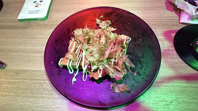 a takoyaki (baked Japanese snack) bungeoppang (fish-shaped pastry) [WOO JI-WON]