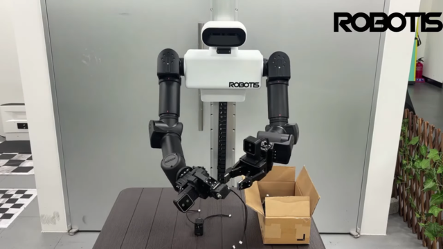 로보티즈의 작업형 휴머노이드 'AI 워커'(AI Worker)가 물류 작업을 하고 있다. 로보티즈 영상 캡쳐