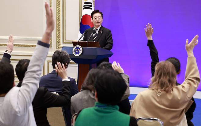President Lee Jae Myung answers questions from reporters during a foreign press briefing at the guesthouse of the Blue House on Dec. 3. [JOINT PRESS CORPS]