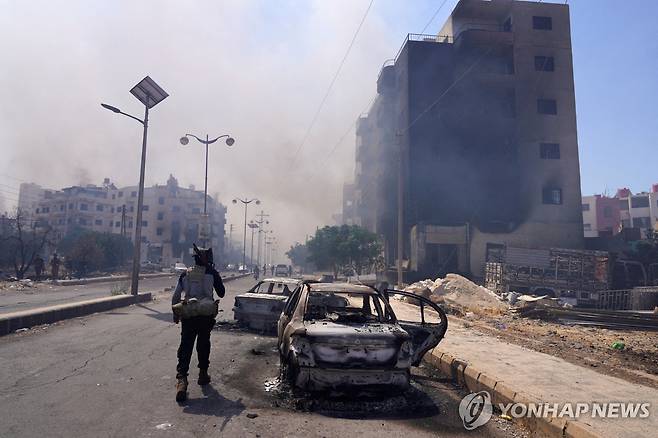 지난 7월 19일 시리아 남부 스웨이다 드루즈족-베두인족 충돌 현장 [로이터 연합뉴스 자료사진. 재판매 및 DB 금지]