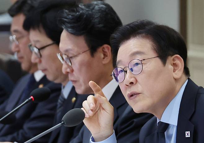 President Lee Jae Myung speaks during a Cabinet meeting at the presidential office in Seoul on Nov. 11, where he called for stronger action against hate speech and the unchecked spread of discriminatory political banners. (Yonhap)