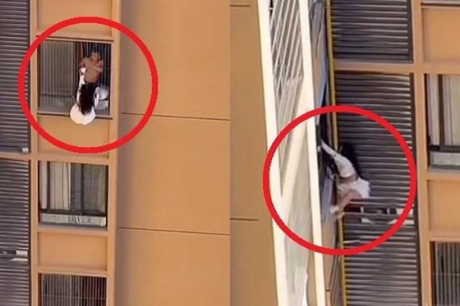 중국 한 아파트에서 10층 난간에 매달려 있던 여성이 이웃집 주민에 의해 극적으로 구조된 일이 벌어졌다. 여성은 유부남과 불륜 중 유부남 아내가 집에 들어오자, 난간에 매달려 있던 것으로 전해졌다.  /사진=더선