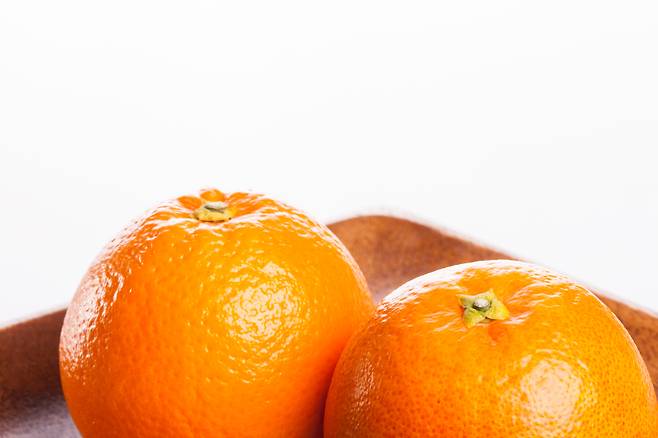 감귤 2~3개로 하루 비타민C 권장량의 절반을 채울 수 있다. [123RF]