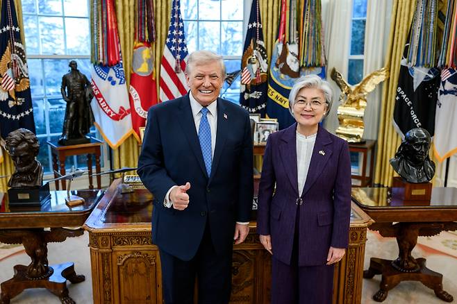 U.S. President Donald Trump poses for a photo with Kang Kyung-wha, Korea's ambassador to the United States, during a credentials ceremony for newly appointed ambassadors at the White House on Dec. 16. [WHITE HOUSE]