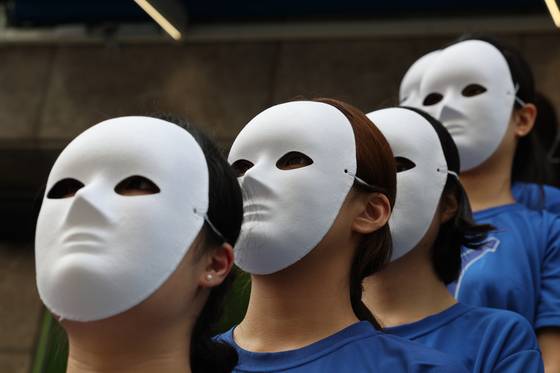 Members of anti-school violence civic organization, The Blue Tree Foundation, stage an anti-violence rally outside their office in Seocho District, southern Seoul, on Sept. 12, 2023. [YONHAP]