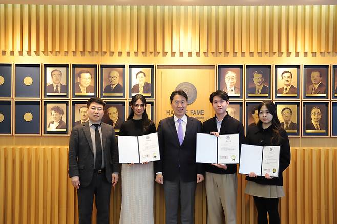 Sara Nuruddin Panjawani poses for a photo with her teammates after getting the top prize for the 2024 ESG/CSR Case Competition, hosted by Yonsei University's School of Business [YONSEI UNIVERSITY]