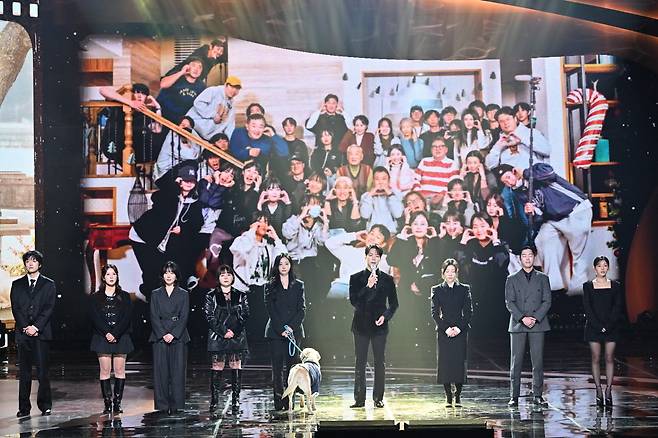 Musical actor Kai (sixth from left) and the cast members from Lee Soon-jae's final drama "Dog Knows Everything" take the stage during the KBS Drama Awards held Wednesday in Yeouido, Seoul. (Yonhap)