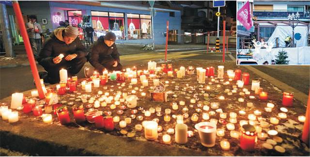 새해 첫날 비극… 추모의 촛불  : 1일 화재로 최소 40명이 숨지고 115명이 부상을 입은 스위스 발레주 크랑몬타나의 술집 ‘르 콘스텔라시옹’ 인근에 시민들이 추모의 촛불을 놓아두고 있다. 작은 사진은 이날 르 콘스텔라시옹에서 당국자들이 화재 원인을 조사하고 있는 모습.  AP AFP 연합뉴스