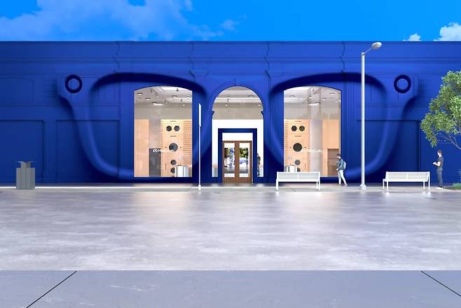 미 로스앤젤레스에 위치한 메타 오프라인 매장의 외관 모습. 메타를 상징하는 파란색 벽에 안경이 그려져있다./메타