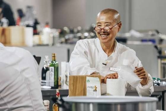 The Ven. Seonjae appears in "Culinary Class Wars" (Netflix)