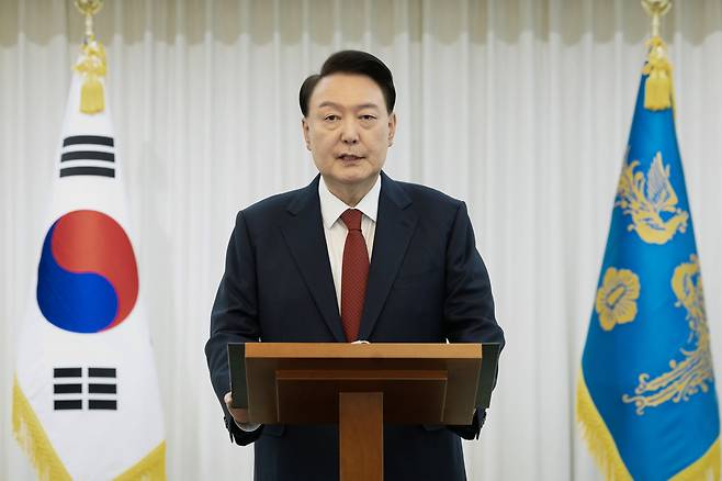 Former President Yoon Suk Yeol delivers a speech in the presidential residence in Hannam-dong of Yongsan-gu, Seoul, in December after the motion to impeach him passed the parliament in December 2024. (Courtesy of Yoon's office)
