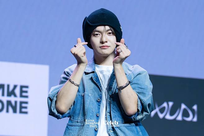 Alpha Drive One’s Leo poses for photos during a showcase for the release of the group’s first EP, ″Euphoria,″ at Blue Square in central Seoul on Jan. 12. [DANIELA GONZALEZ PEREZ]