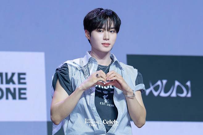 Alpha Drive One’s Junseo poses for photos during a showcase for the release of the group’s first EP, ″Euphoria,″ at Blue Square in central Seoul on Jan. 12. [DANIELA GONZALEZ PEREZ]