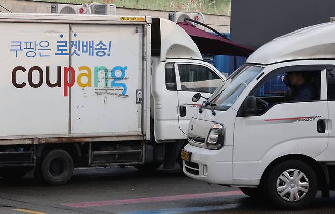 The Coupang logo is seen on a delivery truck parked at the retail company's logistics center in Seoul on Dec. 29, 2025. [YONHAP]