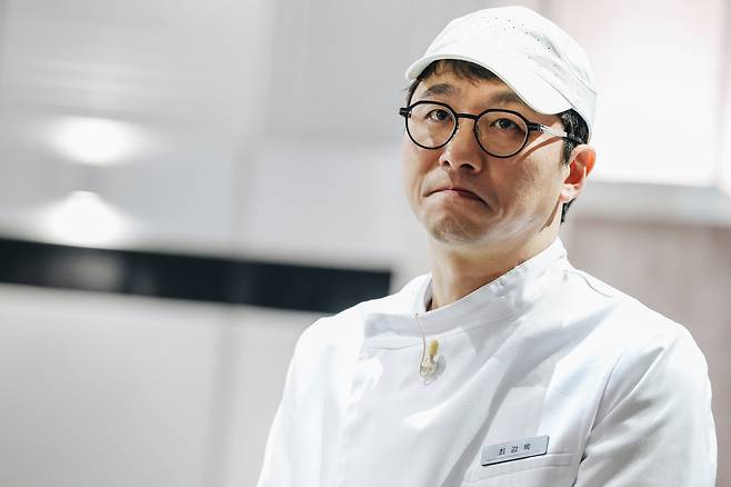 A still from the second season of ″Culinary Class Wars″ (2024-), featuring chef Choi Kang-rok [NETFLIX]
