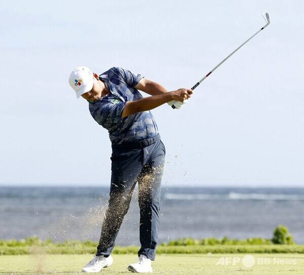 2026년 미국프로골프(PGA) 투어 개막전 '소니 오픈 인 하와이' 우승 경쟁에 뛰어든 김시우 프로가 3라운드에서 경기하는 모습이다. 사진제공=ⓒAFPBBNews = News1 (사진을 무단으로 사용하지 마십시오.)