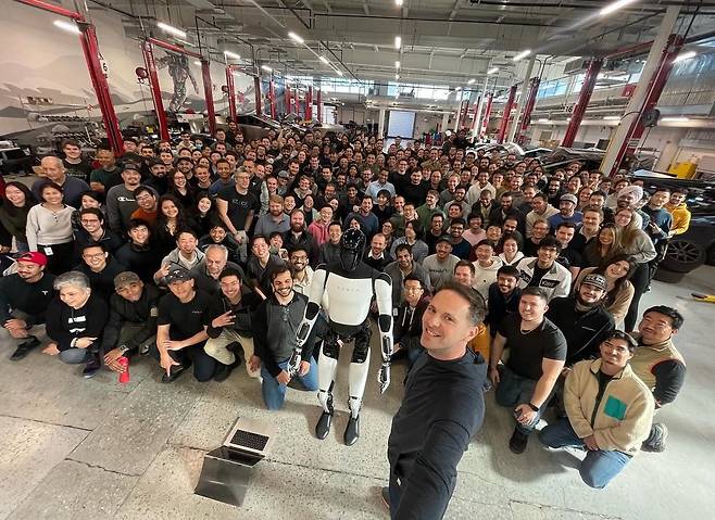 Milan Kovac, an expert in AI and autonomous driving and a former vice president at Tesla, is seen with Tesla employees in this photo uploaded to his social media account [SCREEN CAPTURE]