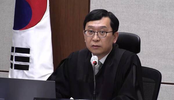 21일 서울중앙지법에서 열린&nbsp;한덕수&nbsp;전 국무총리의 내란 중요임무 종사 혐의 1심 선고 공판에서 이진관 부장판사가 발언하고 있다. 2026.1.21 [서울중앙지법 제공] 연합뉴스