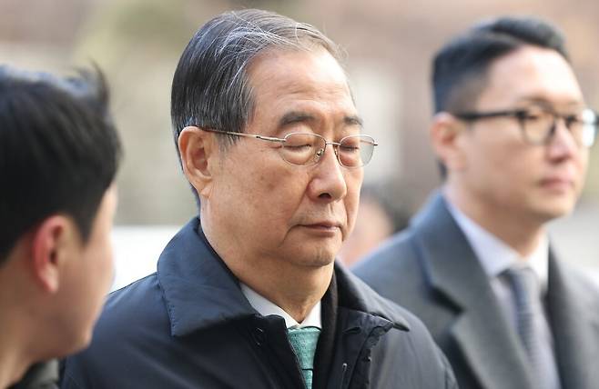 한덕수 전 국무총리가 지난 21일 서울중앙지법에서 열린 1심 선고 공판에 출석하고 있다. 연합뉴스