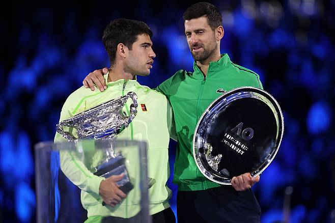 Djokovic chatting with Alcaras, who achieved the youngest career Grand Slam record ever by winning the Australian Open at the awards ceremony. Getty Images Korea