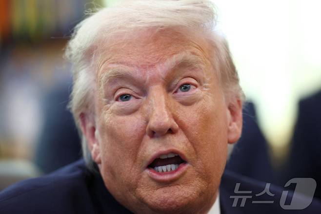 30일(현지시간) 도널드 트럼프 미국 대통령이 워싱턴DC 백악관에서 열린 행정명령 서명 행사에서 취재진의 질문에 답하고 있다. 2026.01.30 ⓒ 로이터=뉴스1 ⓒ News1 김지완 기자