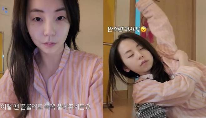 안소희가 자기 전 폼롤러를 겨드랑이에 끼고 꾹꾹 누르며 마사지하는 모습을 보였다. 사진=안소희 유튜브