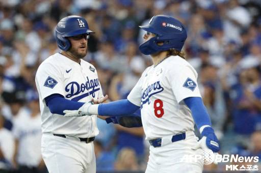 다저스가 맥스 먼시(왼쪽)와는 계약 연장, 키케 에르난데스(오른쪽)와는 재계약했다. 사진=ⓒAFPBBNews = News1