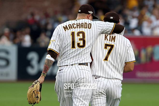 ▲ 매니 마차도와 김하성.