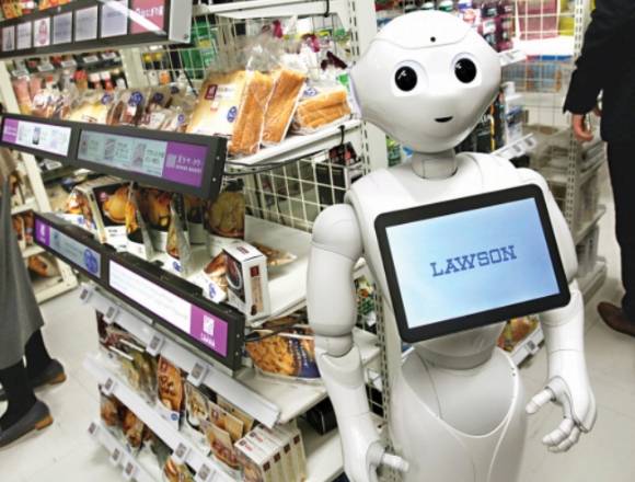 일본 도쿄 미나토구에 있는 편의점체인 로손의 차세대 편의점 연구를 위한 '로손 이노베이션 랩'에 인공지능 로봇 페퍼가 고객을 안내하기 위해 배치돼 있다. [사진=로이터/연합뉴스]