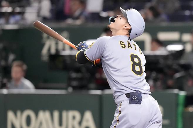 <yonhap photo-3452=""> Hanshin Tigers' Teruaki Sato reacts as he fliles out during the first inning in an MLB Japan Series exhibition baseball game against the Los Angeles Dodgers, Sunday, March 16, 2025, in Tokyo. (AP Photo/Eugene Hoshiko)/2025-03-16 12:37:00/ <저작권자 ⓒ 1980~2025 ㈜연합뉴스. 무단 전재 재배포 금지, AI 학습 및 활용 금지></yonhap>