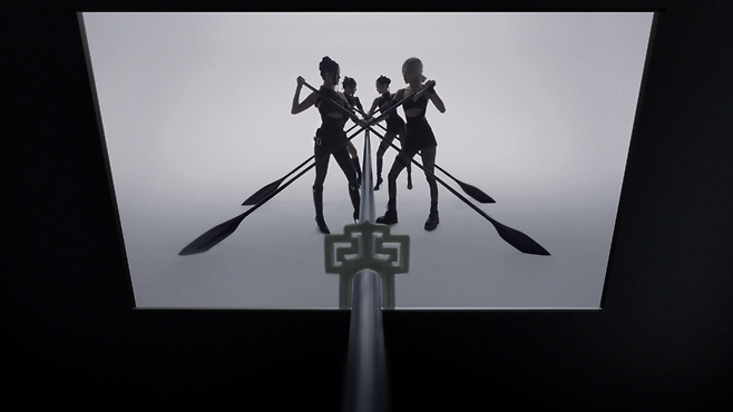 In Blackpink's music video for "Go," the "hoemun" ornamental pattern, a traditional geometric pattern of lines that continue to loop without a clear end, symbolizes continuity and eternity. (YG Entertainment)