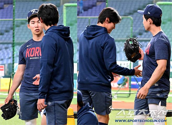 '왜 내 껄 탐내?' 장난기가 발동한 김혜성이 글러브를 빼앗으려는 김도영의 손길을 요리조리 피했다.