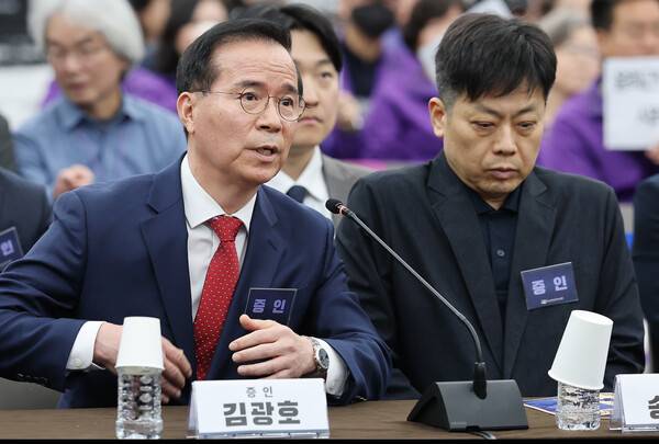 12일 서울 중구 은행회관에서 열린 10·29 이태원참사 진상규명과 재발방지를 위한 특별조사위원회 청문회에서 김광호 전 서울경찰청장이 증인선서를 거부한 이유를 말하고 있다. 2026.3.12. 연합뉴스