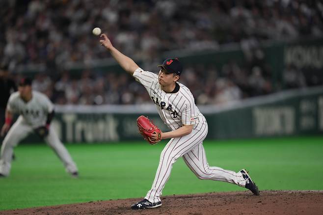 Japan's pitcher Atsuki Taneichi pitches to a South Korea batter during the sixth inning of a World Baseball Classic game between Japan and South Korea on Saturday, March 7, 2026 in Tokyo, Japan. (AP Photo/Hiro Komae)

<저작권자(c) 연합뉴스, 무단 전재-재배포, AI 학습 및 활용 금지>