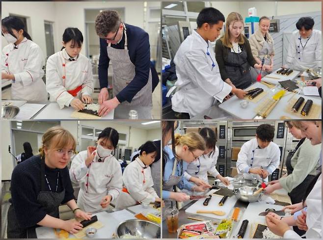 노르웨이 하델란드 민중학교 학생들이 완도수산고 학생들과 함께 지역 특산물 '김'을 활용해 김밥을 만들며 환하게 웃고 있다. 이준경 기자