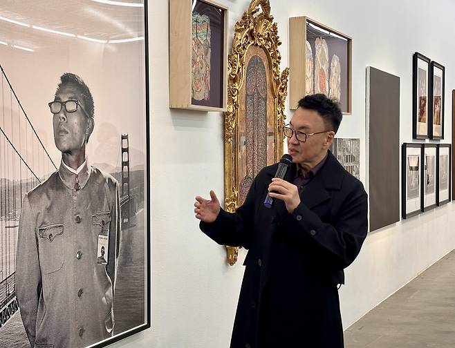 Patrick Sun, founder of the Sunpride Foundation, speaks to reporters about the upcoming queer art exhibit ″X″ at Art Sonje Center in Jongno District, central Seoul, on Wednesday. [LEE JIAN]