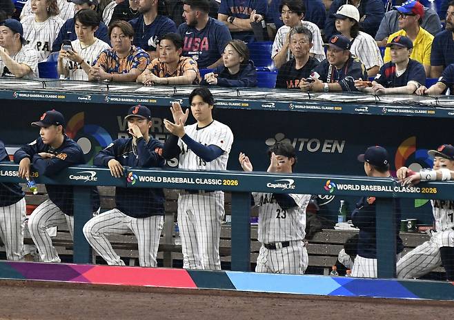 Japan designated hitter Shohei Ohtani cheers for his team during the ninth inning against Japan at loanDepot Park in Miami, Florida on Saturday, March 14, 2026. Photo by Michael Laughlin/UPI연합뉴스