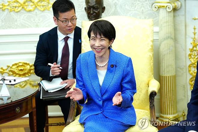 19일(현지시간) 미일정상회담에서 다카이치 총리가 미소짓고 있다 [EPA 연합뉴스 자료사진. 재판매 및 DB금지]