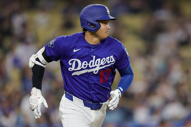 Los Angeles Dodgers designated hitter Shohei Ohtani runs after hitting a double during the third inning of a spring training baseball game against the Los Angeles Angels, Monday, March 23, 2026, in Los Angeles. (AP Photo/Ryan Sun)







<저작권자(c) 연합뉴스, 무단 전재-재배포, AI 학습 및 활용 금지>