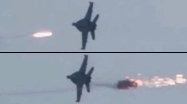 해군  F/A-18E/F  슈퍼호넷 전투기가 이란의 휴대용 대공 미사일  (MANPADS) 공격을 받는 모습. 더워존 영상 캡처