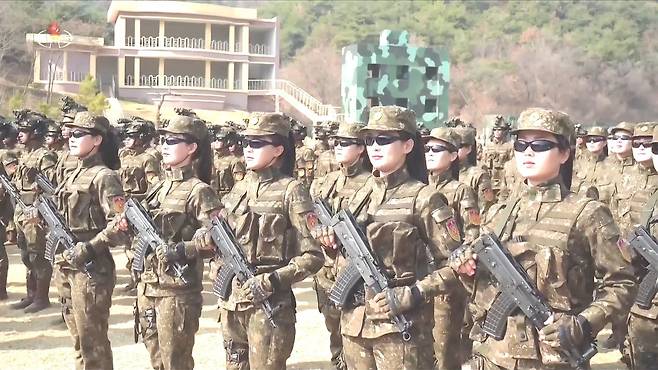 A special operations drill takes place at a training base in North Korea in this footage still released by the Korean Central Television on March 29. [YONHAP]