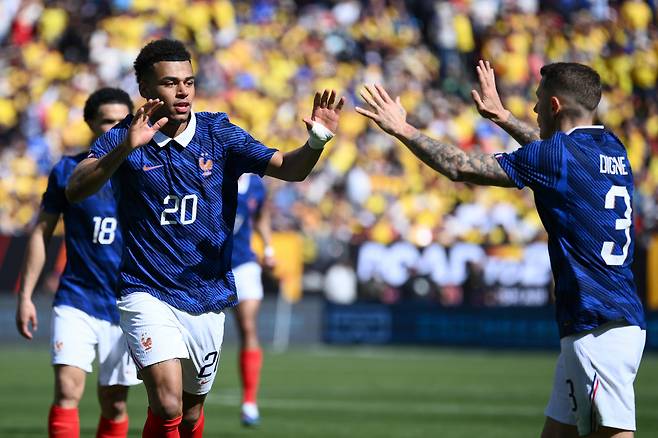 France forward Desire Doue (20) celebrates with Lucas Digne (3) after scoring the opening goal during the international friendly soccer match between Colombia and France in Landover, Md., Sunday, March 29, 2026. (AP Photo/Nick Wass)
<저작권자(c) 연합뉴스, 무단 전재-재배포, AI 학습 및 활용 금지>