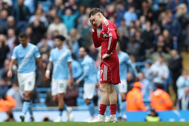 Liverpool's German midfielder #07 Florian Wirtz reacts after City score their second goal during the English FA Cup quarter final football match between Manchester City and Liverpool at the Etihad Stadium in Manchester, north west England, on April 4, 2026. (Photo by Darren Staples / AFP) / RESTRICTED TO EDITORIAL USE. No use with unauthorized audio, video, data, fixture lists, club/league logos or 'live' services. Online in-match use limited to 120 images. An additional 40 images may be used in extra time. No video emulation. Social media in-match use limited to 120 images. An additional 40 images may be used in extra time. No use in betting publications, games or single club/league/player publications. /
<저작권자(c) 연합뉴스, 무단 전재-재배포, AI 학습 및 활용 금지>