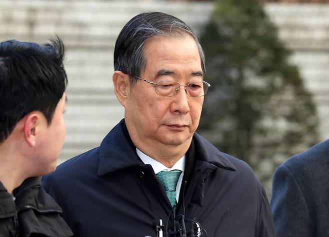 한덕수 전 국무총리가 지난 1월 서울 서초구 서울중앙지법에서 열린 내란 우두머리 방조, 내란 중요임무 종사 혐의 사건 1심 선고공판에 출석하고 있다. /사진=뉴스1