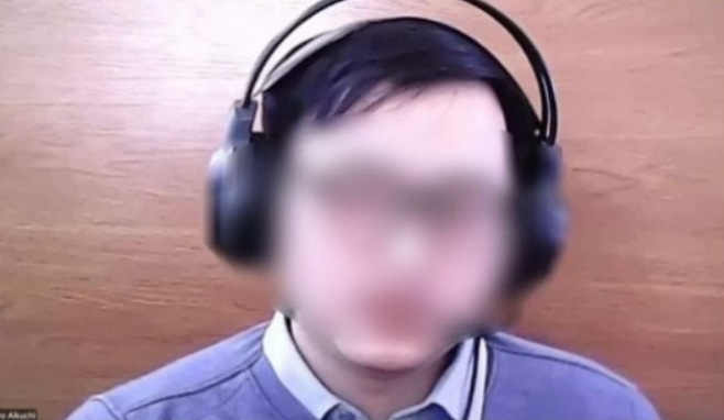 북한 IT공작원으로 의심되는 인물이 면접을 보는 영상. 영상 속에서 이 면접자는 ‘김정은을 욕해보라’는 질문자의 요구에 답변하지 못한채 연결을 끊어버렸다. [X 갈무리]